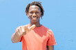 © Cavan Images - Happy African American male pointing at camera
