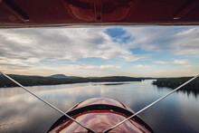 View From Cockpit Of Vintage Plane Flying Over Kezar Lake