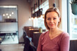 © Monkey Business - Head And Shoulders Portrait Of Mature Businesswoman  Working In Modern Office