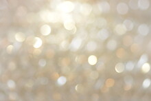 Blur Glitter, Bockeh, Defocused Gold Festive Background, Texture. Christmas Holiday Backdrop Neutral Color.