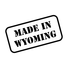 Wall Mural - Made in Wyoming state sign in rubber stamp style vector