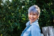© Clare Seibel-Barnes/Austockphoto - portrait of a senior woman smiling in the garden
