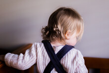 Little Girl With Curls Facing Away