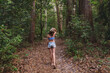 © Gillian Vann/Austockphoto - young teen walking in the forest in summer