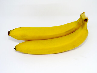 Two yellow and wonderful bananas.     