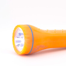 Orange Flashlight Isolated On White