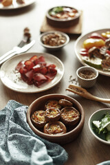 Wall Mural - dishes and snacks of traditional Caucasian Georgian cuisine. classic national serving on a rustic wooden table