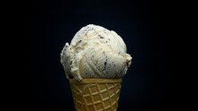 Ice Cream Cone Cookies & Cream On Black Background.