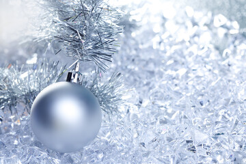 Canvas Print - christmas baubles silver on winter ice with star 