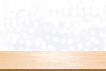 Wall Mural - Wood table top on white bokeh abstract background.