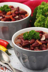 Two bowls with traditional Georgian dish - lobio