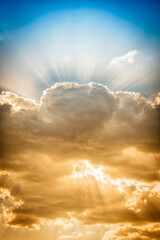 Wall Mural - Dramatic cloud with sunbeams