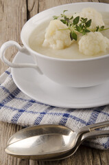 cauliflower soup in a white bowl