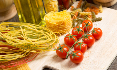 Wall Mural - close-up of cherry tomatoes and pasta