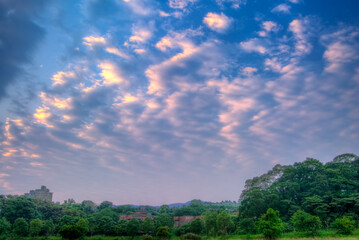 Wall Mural - clouds over farm