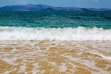 Sticker - ocean with island in background and froth