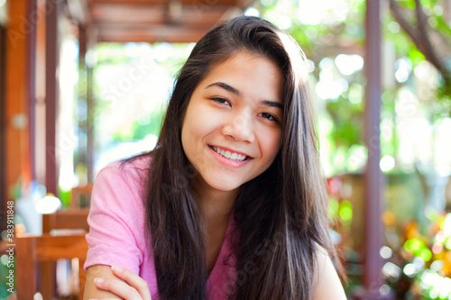Fotografía Young teen girl relaxing outdoors on veranda