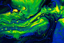 Fluid Art Texture. Backdrop With Abstract Mixing Paint Effect. Liquid Acrylic Artwork With Flows And Splashes. Mixed Paints For Baner Or Wallpaper. Green, Blue And Yellow Overflowing Colors
