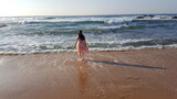 Fototapeta Konie - Woman on the Beach