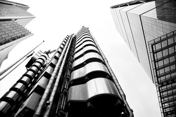 Wall Mural - Low angle shot of modern glass city buildings