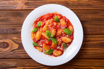 Canvas Print - Italian homemade potatoes gnocchi with tomatoes sauce