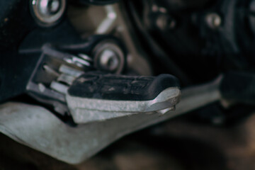 Wall Mural - Closeup of a motorcycle parked in the streets of the city center of the metropolitan area
