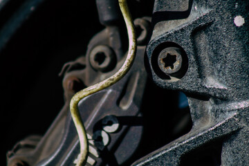 Wall Mural - Closeup of a motorcycle parked in the streets of the city center of the metropolitan area
