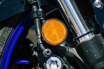 Canvas Print - Closeup of a motorcycle parked in the streets of the city center of the metropolitan area
