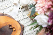© Hazal - Wedding bouquet with two gold rings. Wedding decor, art, florist, flat lay, top view