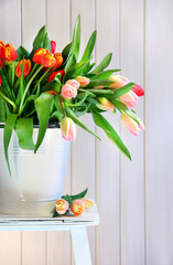 Poster - Spring tulips on an old bench