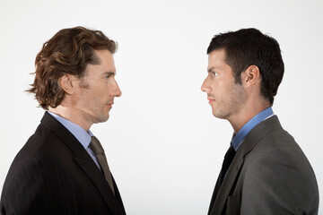 Businessmen Standing Face to Face