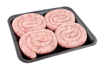 Wall Mural - Tray of four raw Cumberland pork sausage swirls isolated on a white background