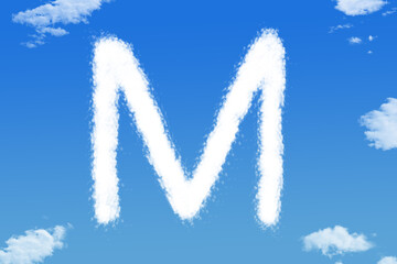 Canvas Print - Letter M cloud shape on blue sky