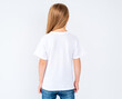 © Ievgen Skrypko - little girl in brand new white blank t-shirt on white background with copy space, back view