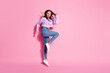© deagreez - Full size photo of positive cheerful girl enjoy rejoice discount lottery win jump raise fists scream yes wear style stylish pullover isolated over pastel color background