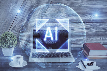 double exposure of desktop computer and technology theme hologram. concept of software development.