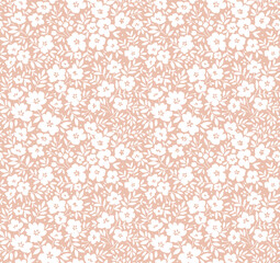 Vector seamless pattern. Pretty pattern in small flowers. Small white flowers. light beige background. Ditsy floral background. The elegant the template for fashion prints.