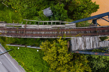 Canvas Print - This is a top-down aerial view of railroad tracks o an abandoned railroad bridge that carried the Chesapeake & Ohio Railroad and CSX Transportation over the Kanawha River in Charleston, West Virginia.