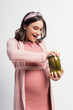 © LIGHTFIELD STUDIOS - excited and pregnant woman opening jar with pickled cucumbers isolated on white