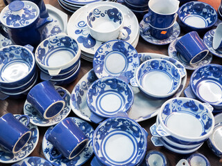 Old porcelain dishes for sale at a flea market in the old city of Jaffa, Tel Aviv, Israel