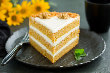 Wall Mural - Delicious carrot cake with nuts. Selective focus.