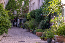 Paris, France - June 24, 2020: Passage Lhomme, One Of The Romantic Courtyards In The East Of Paris, France. These Bucolic, Unusual And Hidden Spots Are Delightful Gems To Explore