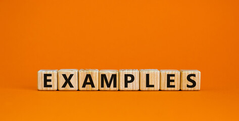 Concept word 'examples' on cubes on a beautiful orange background. Business concept. Copy space.