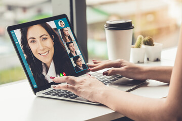 Video call business people meeting on virtual workplace or remote office. Telework conference call using smart video technology to communicate colleague in professional corporate business.