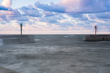 Wall Mural - Entrance to the yacht port. Ustka Marina minimalistic long exposure photography. Poland