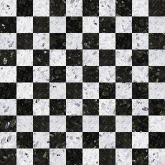 Mosaic of squares of natural white and black marble. Polished stone background texture for design