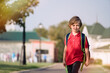 © D'Action Images - The schoolboy returns from school in a good mood