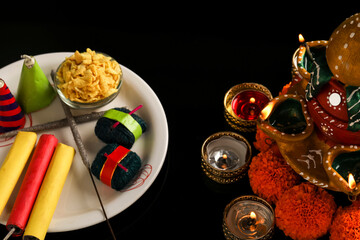 Sticker - fire crackers,lamp and flower on dark background , Indian festival Diwali