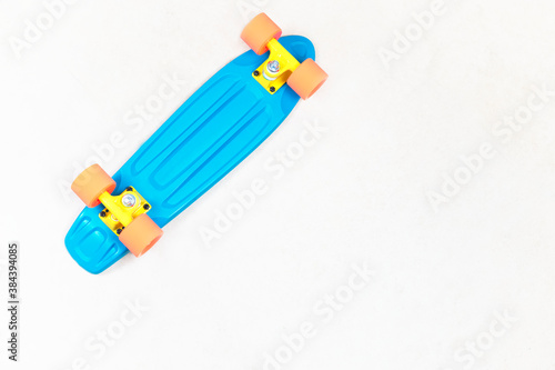 Cuadros en Lienzo Skateboard cruiser style blue yellow and orange view from above