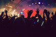 © udmurd - Abstract blur atmosphere: happy people enjoying outdoor music festival concert, raised up hands and clapping of pleasure, active night life concept, play of light and shadow on the stage